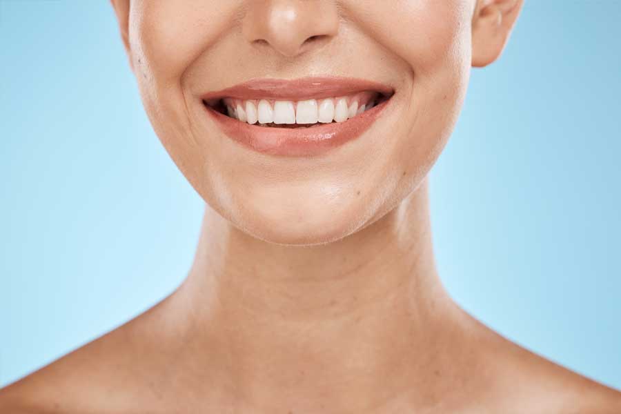 Close-up of a healthy smile after dental or oral surgery care.